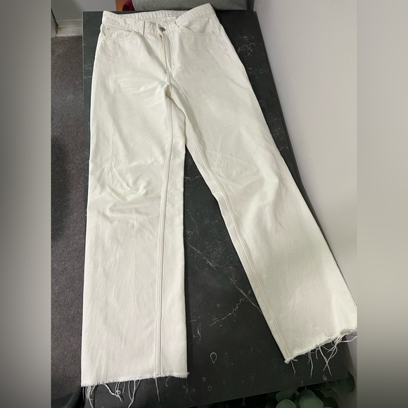 H&M Pants - H&M white ultra high waist wide jeans. Fringe bottoms. Size 10